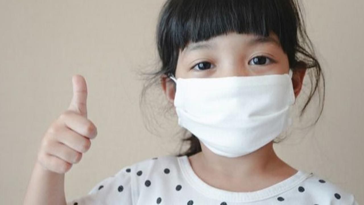 ilustrasi anak memakai masker