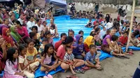 Warga korban gempa Lombok di pengungsian mengikuti HUT ke-73 RI (Liputan6.com/Sunariyah)
