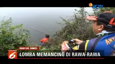 Ratusan warga Ogan Ilir lomba memancing tingkat kabupaten di rawa-rawa.