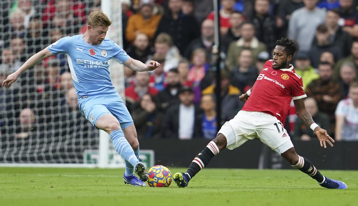 Fred. Gelandang Manchester United ini tampil 9 kali dan seluruhnya menjadi starter dari 11 laga Setan Merah. Ia sering melakukan salah umpan yang berujung kerugian bagi tim. Sudah saatnya Ole Gunnar Solskjaer mencadangkannya dan mulai mempercayakan Donny van de Beek sebagai starter. (AP/Jon Super)
