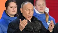 Kehadiran Putin untuk ikut dalam peringatan 10 tahun aneksasi Krimea oleh Rusia. (NATALIA KOLESNIKOVA/AFP)