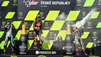 Pembalap Red Bull KTM Factory Racing, Brad Binder, melakukan selebrasi usai menjuarai balapan MotoGP Republik Ceska di Sirkuit Brno, Minggu (9/8/2020). Brad Binder menjadi yang tercepat dengan catatan waktu 41 menit 38,764 detik. (AFP/Joe Klamar)