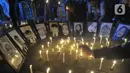 Aksi solidaritas dan doa bersama tersebut mengangkat tagar #pelajarberduka. (merdeka.com/Imam Buhori)