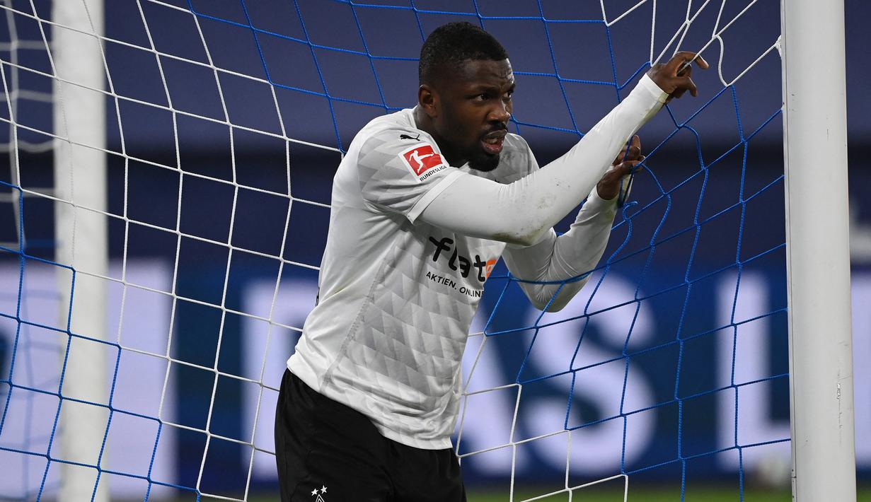 Marcus Thuram. Sayap kiri berusia 24 tahun yang merupakan putra kandung Lilian Thuram, kini memasuki musim ke-3 bersama Borussia Monchengladbach ini memiliki klausa pelepasan senilai 38,5 juta pound. Total telah tampil 13 laga di semua ajang musim ini. (AFP/Pool/Ina Fassbender)
