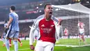 Arsenal sukses mengalahkan Tottenham dengan comeback apik 2-1 dalam laga pekan 21 Premier League 2024/2025 yang digelar di Emirates Stadium, Kamis (16/1/2025) dini hari WIB. (Bradley Collyer/PA via AP)