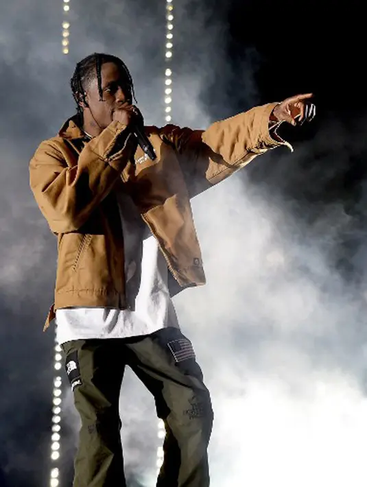 Di usia kehamilannya yang sudah empat bulan, ternyata baru terungkap latar belakang Travis, ayah dari calon anak Kylie itu. Nampaknya itu menjadi salah satu cobaan yang dihadapi Kylie saat ini. (AFP/Kevin Winter)