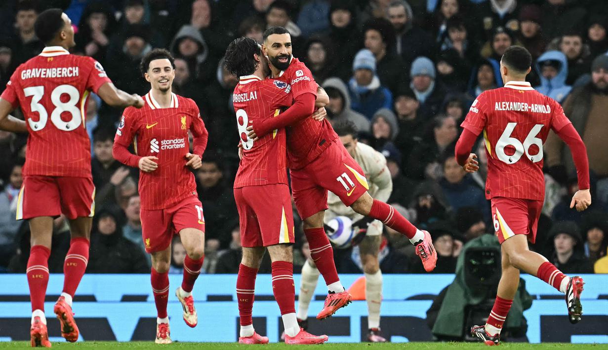 Mohamed Salah menjadi aktor kemenangan Liverpool saat mengancurkan Manchester City dalam lanjutan Liga Inggris 2024/2025 di Etihad Stadium, Minggu (23/2/2025) malam WIB. (AFP/Paul Ellis)