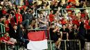 Sejumlah suporter menyanyi bersama saat memberi dukungan untuk Timnas Indonesia U-19 melawan Brunei Darussalam pada laga kedua Grup A Piala AFF U-19 2022 di Stadion Patriot Candrabhaga, Bekasi, Senin (4/7/2022). (Bola.com/M Iqbal Ichsan)