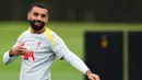 Pemain depan Liverpool, Mohamed Salah bereaksi saat berlatih di tempat latihan tim di Liverpool, barat laut Inggris, pada 16 September 2024. (Peter POWELL/AFP)