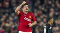Pemain Manchester United, Harry Maguire melakukan selebrasi setelah mencetak gol ke gawang FC Copenhagen pada laga Grup A Liga Champions 2023/2024 di Old Trafford, Manchester, Inggris, Rabu (25/10/2023) dini hari WIB. Maguire keluar sebagai salah satu penentu kemenangan tim selain Andre Onana yang berhasil menepis tendangan penalti di penghujung laga. Ia sukses mencetak satu-satunya gol pada menit ke-72. (AP Photo/Dave Thompson)