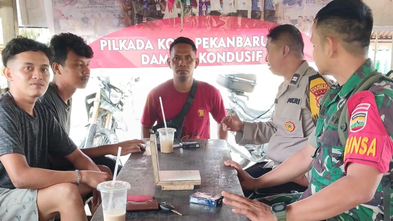 Aksi Bhabinkamtibmas dan Babinsa Bikin Adem Pilkada di Pekanbaru
