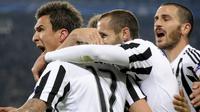 Selebrasi Mario Mandzukic usai mencetak gol ke gawang Manchester City pada pertandingan kelima Grup D Liga Champions di Juventus Stadium, Kamis (26/11/2015) dini hari WIB.