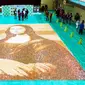 Guinness World Records memberikan penghargaan bagi pembuatan replika Mona Lisa yang terbuat dari kue beras. (Sumber foto: Guinness World Records)