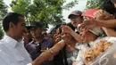 Capres PDIP Joko Widodo kunjungi Manado untuk bersosialisasi, Sabtu (9/4/2014) (Liputan6.com/Herman Zakharia).