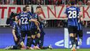 Inter Milan membuka keunggulan pada menit ke-38 melalui tendangan keras Lautaro Martinez. (Alexandra BEIER/AFP)