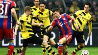 Borussia Dortmund sukses melenggang ke final DFB Pokal usai mengalahkan Bayern Muenchen melalui adu drama penalti (2-0), setelah hanya bermain imbang 1-1 hingga babak perpanjangan waktu. (AFP)