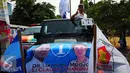 Calon Walikota Tangerang Selatan,  Ikhsan Modjo mengikuti Karnaval Sosialisasi Pilkada Damai Kota Tangerang Selatan, Minggu (20/9/2015) KPUD Kota Tangsel mengajak masyarakat untuk mensukseskan Pilkada Serentak. (Liputan6.com/Helmi Afandi)