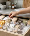 Ide menata bumbu sachet agar mudah dicari dan tidak bikin dapur berantakan (AI generated)