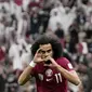 Pemain Qatar, Akram Afif, melakukan selebrasi setelah mencetak gol ke gawang Lebanon pada babak penyisihan Grup A Piala Asia 2023 di Stadion Lusail, Jumat (12/1/2024). (AP Photo/Thanassis Stavrakis)