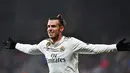 Meski masih mencetak tiga gol, Bale dirasa memiliki kontribusi lebih saat terciptanya banyak gol Madrid. MU membutuhkan Bale karena lini depan yang kurang cakap dan cepat saat menyerang. (AFP/Gabriel Bouys)