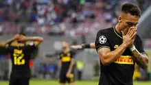 Penyerang Inter Milan, Lautaro Martinez, tampak kecewa usai ditahan imbang Slavia Praha pada laga Liga Champions di Stadion Giuseppe Meazza, Selasa (17/9/2019). Kedua tim bermain imbang 1-1. (AP/Antonio Calanni)