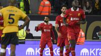 Pemain Liverpool, Mohamed Salah, mencetak gol kedua The Reds dalam kemenangan 2-1 atas Wolverhampton Wanderers di Molineux Stadium, Sabtu (28/9/2024) malam WIB. (AP Photo/Rui Vieira)