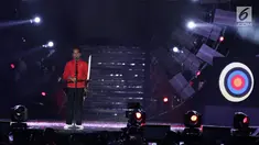 Presiden Jokowi memberi sambutan saat hitung mundur Asian Games 2018 di Monas, Jakarta, Jumat (18/8). Acara ini menandai setahun Jakarta-Palembang sebelum menjadi tuan rumah Asian Games ke-18 itu. (Liputan6.com/Herman Zakharia)