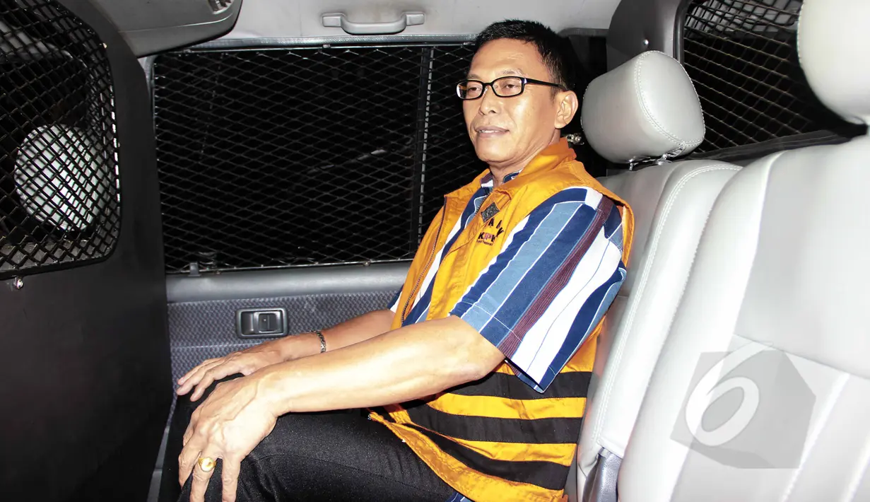 Ajudan Ketua DPRD Bangkalan Fuad Amin, Abdul Rouf kembali menjalani pemeriksaan di Gedung KPK, Jakarta, Selasa (24/3/2015). Abdul Rauf diperiksa terkait kasus dugaan korupsi jual beli gas alam di Bangkalan, Jawa Timur. (Liputan6.com/Helmi Afandi)