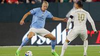 Penyerang anyar Manchester City, Erling Haaland, mencetak gol tunggal kemenangan timnya atas Bayern Munchen pada laga pramusim&nbsp;di Lambeau Field, Wisconsin, Minggu (24/7/2022) pagi WIB. (JAMIE SQUIRE / GETTY IMAGES NORTH AMERICA / Getty Images via AFP)