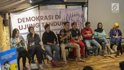 Dirut LBH Jakarta Arif Maulana berbicara dalam konferensi pers bertajuk Demokrasi di Ujung Tanduk, Jakarta, Minggu (15/9/2019). Arief menilai demokrasi Indonesia mengalami kemunduran jika dilihat dari supremasi hukum, kebebasan sipil, partisipasi sipil, dan perlindungan HAM. (Liputan.com/Faizal Fana