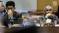 Ketua KPK Agus Rahardjo (kanan) bersama Wakill Pimpnan KPK Laode Muhammad Syarif mengikuti Rapat Dengar Pendapat dengan Komisi III DPR, di Kompleks Parlemen Senayan, Jakarta, Senin (23/7). (Liputan6.com/Johan Tallo)