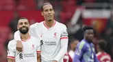 Manchester United kalah dengan skor besar 0-3 dari rival abadinya, Liverpool. Keduanya bertemu pada laga pekan ketiga Liga Inggris 2024/2025 di Old Trafford, Minggu (1/9/2024) malam WIB. (Foto AP/Dave Thompson)
