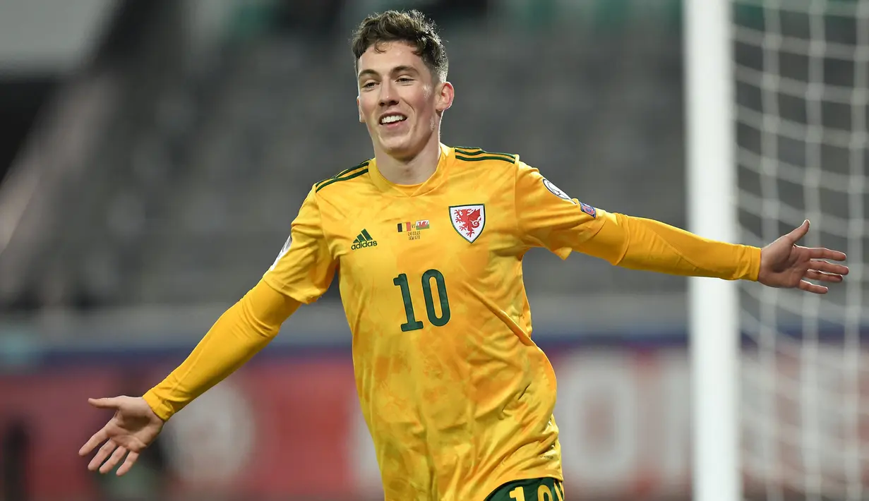 Harry Wilson. Gelandang Wales ini melakukan debut bersama timnas senior saat berusia 16 tahun pada laga Kualifikasi Piala Dunia 2014 melawan Belgia yang berkesudahan 1-1, 15 Oktober 2013. Total telah mengoleksi 34 Caps dengan torehan 5 gol dan 5 assist. (AFP/John Thys)