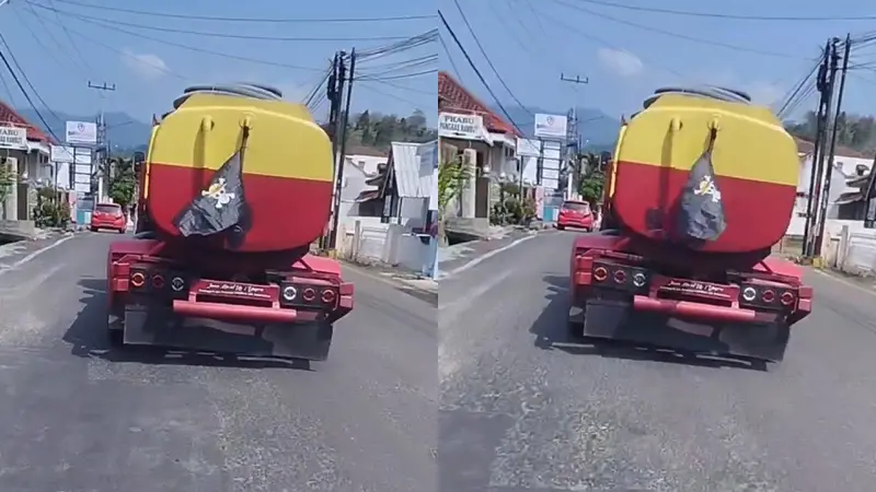 Bendera one piece berkibar di mobil tangki sedot WC