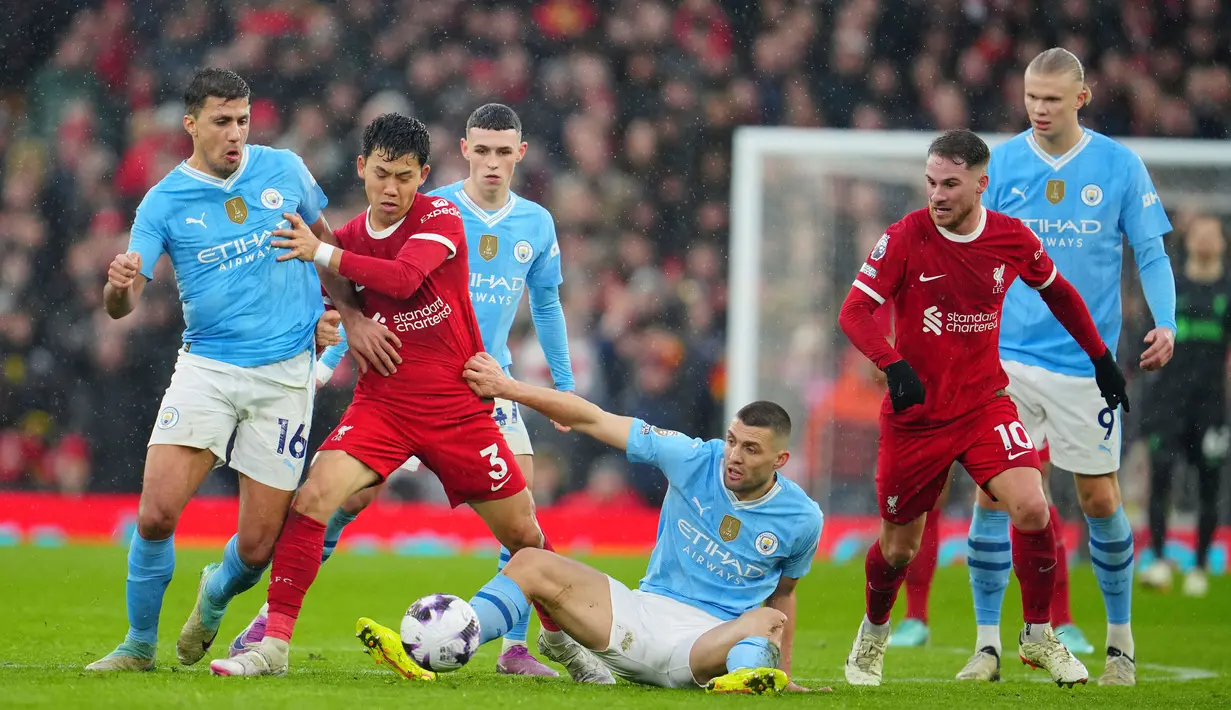 Hasil imbang ini membuat Liverpool dan Manchester City gagal menggeser Arsenal dari puncak klasemen Liga Inggris. (AP Photo/Jon Super)