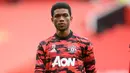 Amad Diallo. Sayap berusia 19 tahun ini didatangkan Manchester United dari Atalanta pada pertengahan musim 2020/2021 dan hanya tampil dalam 8 laga hingga akhir musim. Peminjamannya ke Feyenoord musim ini batal akibat terbelit cedera saat sesi latihan terakhir. (Foto: AFP/Pool/Michael Regan)