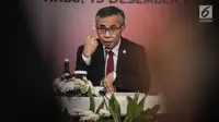 Ketua Dewan Komisioner Otoritas Jasa Keuangan (OJK) Wimboh Santoso saat menggelar jumpa pers tutup tahun 2018 di Gedung OJK, Jakarta, Rabu (19/12). (Liputan6.com/Faizal Fanani)