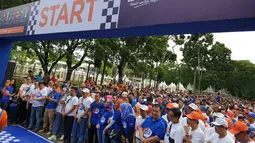 Ribuan perserta bersiap mengikuti fun walk dalam BRI Family Festival (BRIFFEST) 2018 di JCC, Jakarta, Minggu (16/12). BRIFFEST 2018 diikuti oleh 65 ribu peserta. (Liputan6.com/Pool/Humas BRI)
