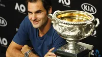 Roger Federer dalam sesi konferensi pers usai memastikan kemenangan atas Rafael Nadal di final Australia Terbuka 2017. (AP Photo/Kin Cheung)