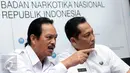 Kepala BNN, Budi Waseso (kanan) berbincang dengan Deputi Penindakan BNN, Arman Depari saat rilis pengungkapan jaringan pengedar narkotika internasional dengan barang bukti sabu 11.076 gram. (Liputan6.com/Helmi Fithriansyah)