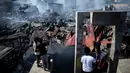 Sejumlah warga melihat rumah-rumah mereka hangus terbakar di sebuah daerah kumuh di Navotas, Manila (8/11). Dilaporkan sekitar 150 keluarga terkena dampak kebakaran tersebut. (AFP Photo/Noel Celis)
