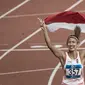 Pelari Indonesia, Emilia Nova, saat berlaga pada nomor 100 meter lari gawang Asian Games di SUGBK, Jakarta, Minggu (26/8/2018). Emilia Nova berhasil menyabet medali perak setelah membukukan waktu 13,33 detik. (Bola.com/Vitalis Yogi Trisna)
