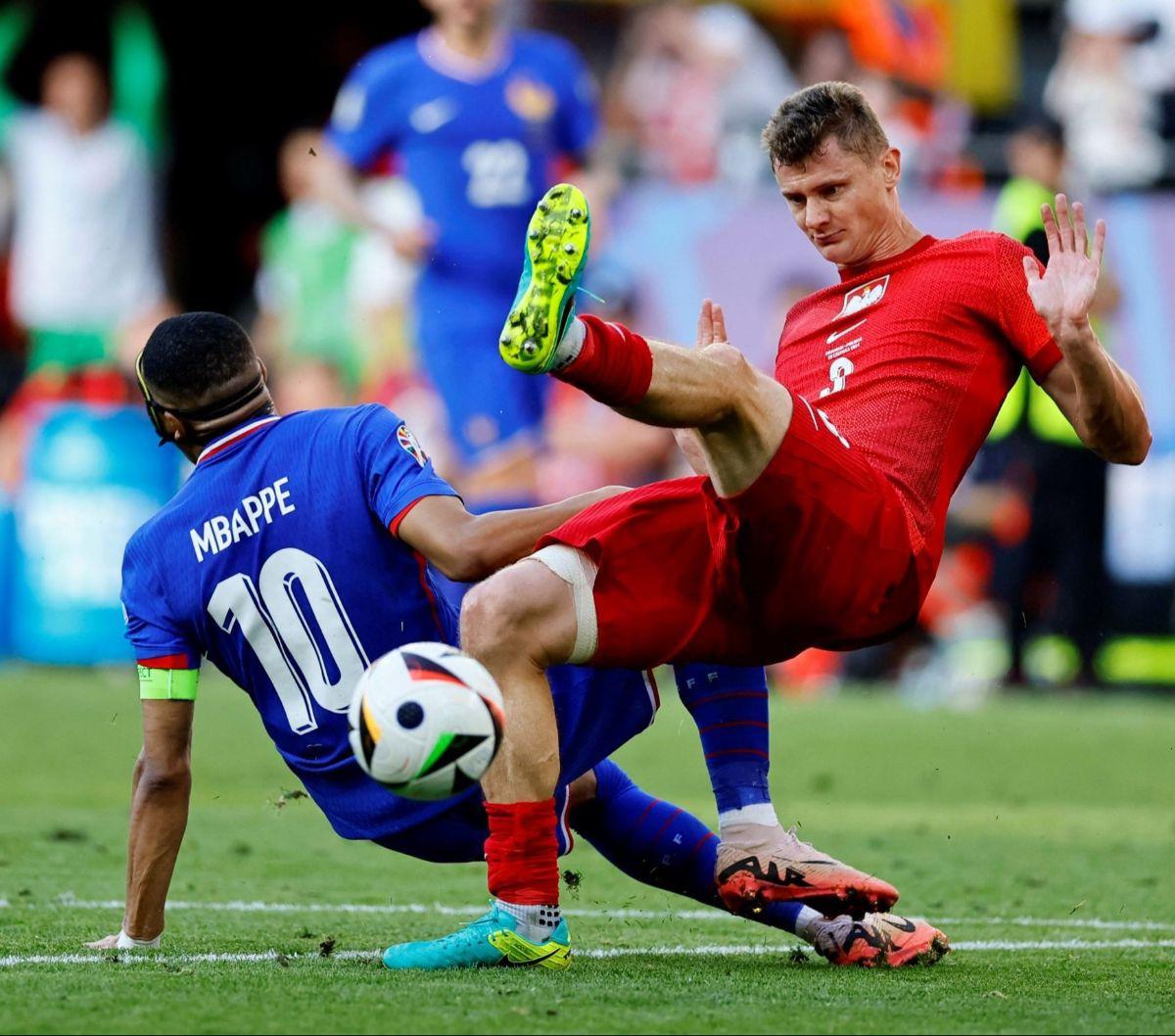 Laga matchday 3 Grup D Euro 2024 antara Timnas Prancis dan Timnas Polandia yang berlangsung sengit di Signal Iduna Park pada Selasa (25/06/2024. Kedua tim bermain imbang dengan skor 1-1. Foto: Reuters<br>