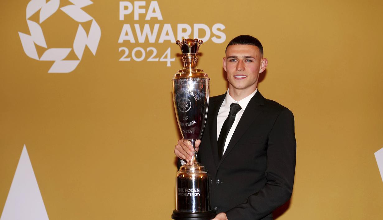 Ditambah, sang pemain mencetak 27 gol dan memberikan 12 assist dalam 53 penampilan di semua kompetisi untuk tim asuhan Pep Guardiola. (Peter Byrne/PA via AP)