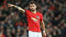 1. Bruno Fernandes (7 gol dan 4 assist) : Manchester United melaju ke semi final Liga Europa berkat gol tunggal yang dicetak Bruno Fernandes ke gawang Copenhagen di perempat final. Gol itu juga membuat pemain asal Portugal ini menjadi top skor sementara Liga Europa musim ini. (AFP/Lindsey Parnaby)