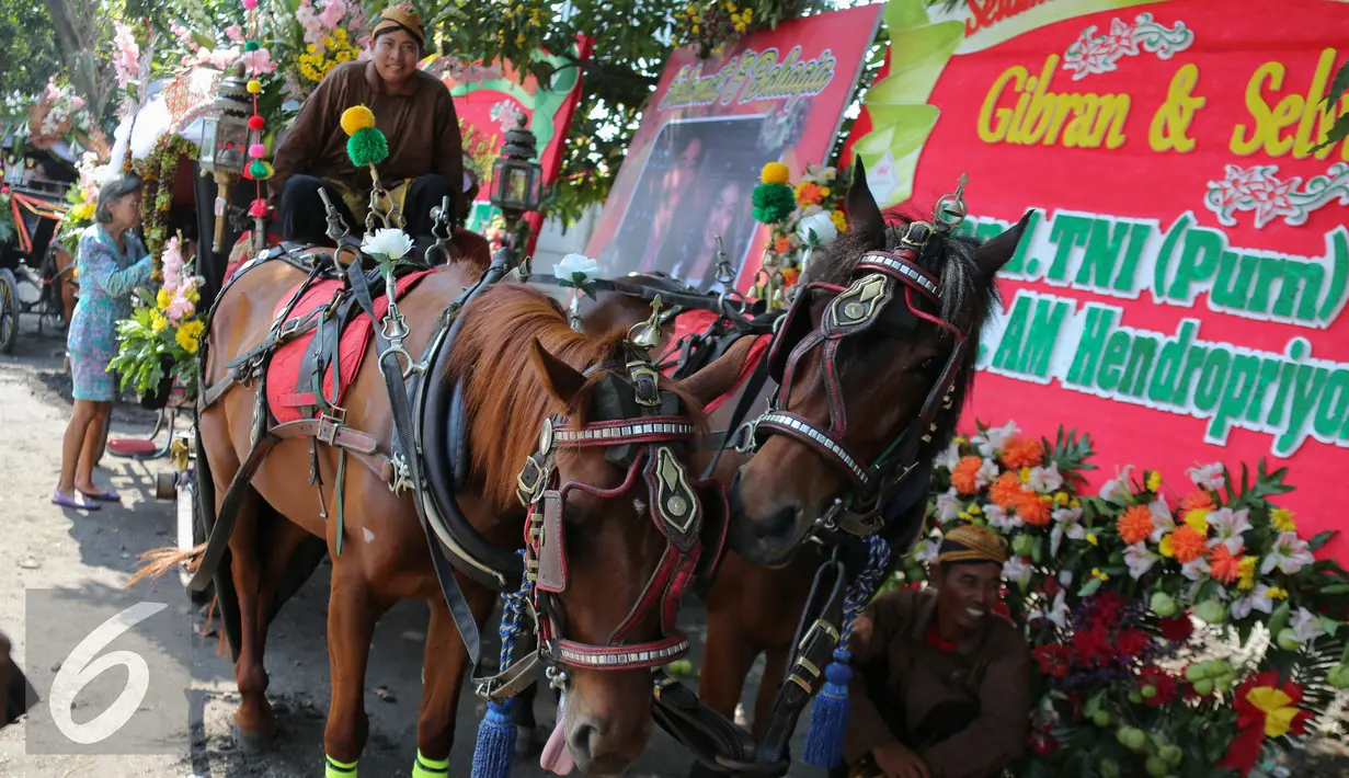 Penampakan kereta kencana pengiring pengantin Putra sulung Presiden Joko Widodo, Gibran Rakabuming Raka, Solo, Kamis (11/6/2015). Gibran menikahi Selvi Ananda dengan memakai adat Jawa. (Liputan6.com/Faizal Fanani) 