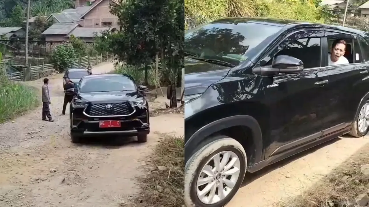 Tangkapan layar mobil dinas Bupati Lampung Selatan, Radityo Egi Pratama terjebak saat melintas di jalan rusak