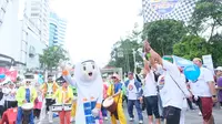 Badan Pengelola Keuangan Haji (BPKH) bersama mitra kerjanya menggelar Fun Walk di kawasan Senayan, Jakarta, Minggu pagi (10/12/2023). (Ist).