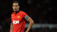 Rio Ferdinand memilih Sevilla sebagai lawan Manchester United pada laga testimonialnya yang berlangsung pada 2013. (AFP/Andrew Yates)