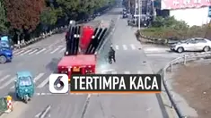 vertical tertimpa kaca